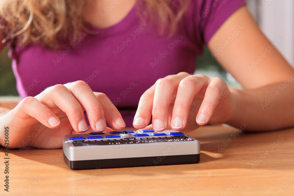 Visually impaired using Braille display Stock Photo Adobe Stock