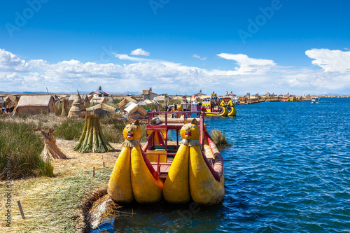 Close-up traditional reed boat as transportation for tourists, floating Uros islands on lake Titicaca in Peru, South America.