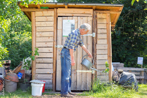 Man watering plant