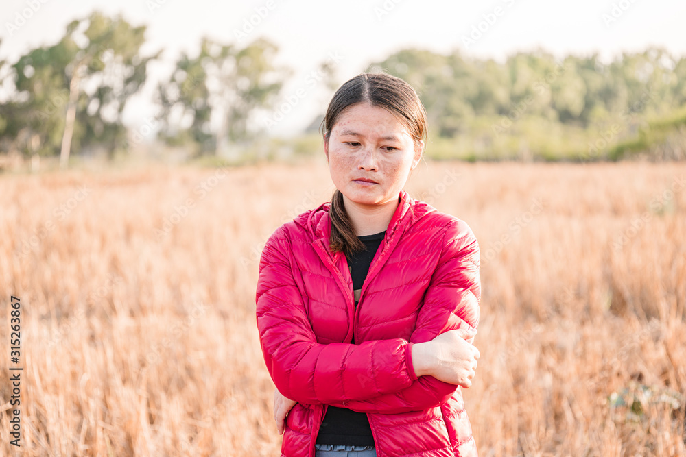 The girl is traveling in the grass field cockscomb grass. The girl is traveling in the grass field cockscomb grass.