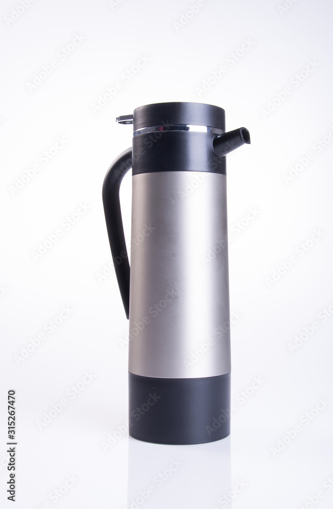 Thermo or Thermo flask from stainless steel on background new. Thermo or Thermo flask from stainless steel on background new.