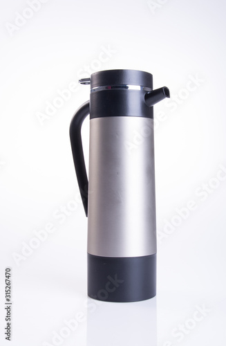Thermo or Thermo flask from stainless steel on background new.