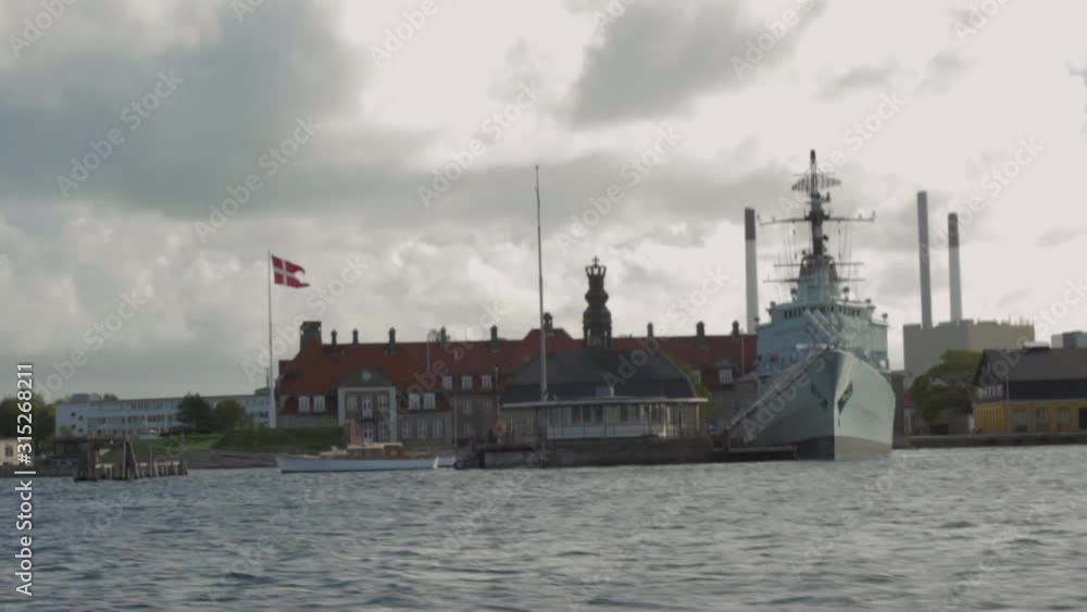 Floating along the sea from right to left. View of Old warship of the Danish fleet in the harbor of Copenhagen Denmark. Floating along the sea from right to left. View of Old warship of the Danish fleet in the harbor of Copenhagen Denmark.