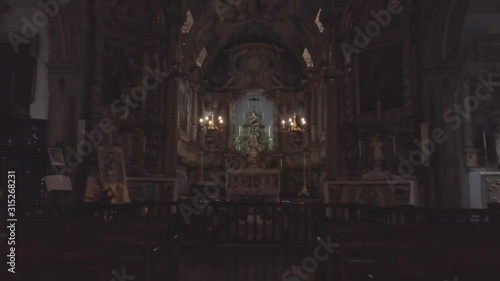 Wallpaper Mural nobody inside ancient catholic church moving forward past empty benches towards the holy alter gold decor at daytime in Madeira island Portugal religious buildings Torontodigital.ca