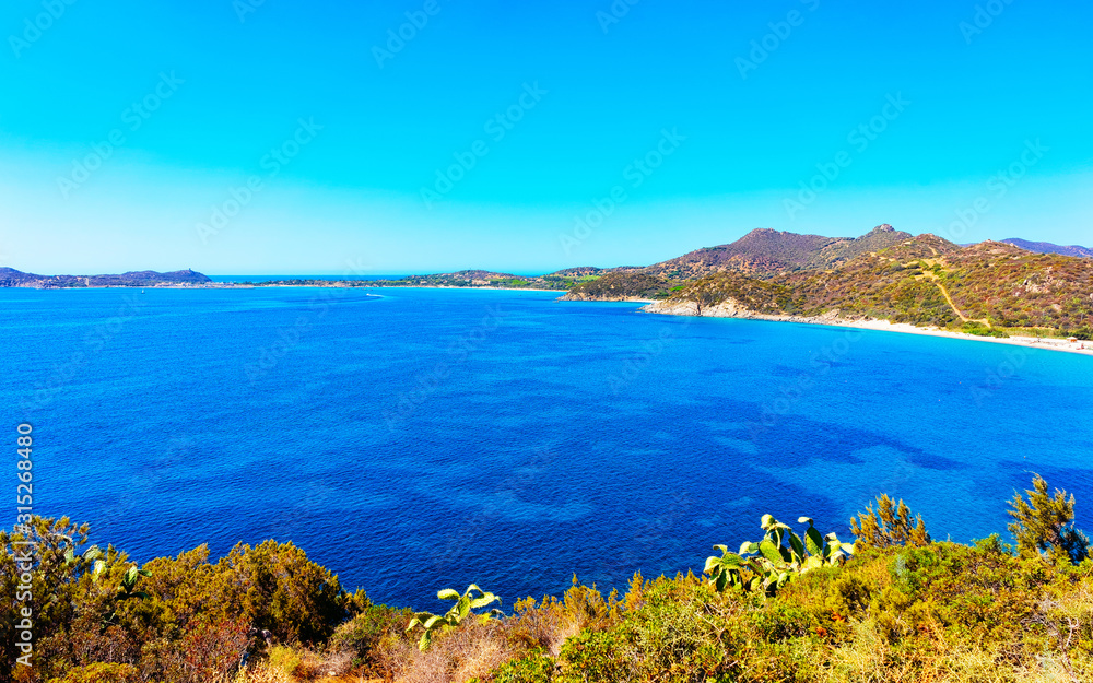 Fototapeta premium Beautiful nature of Villasimius and with Blue Waters of the Mediterranean Sea on Sardinia Island in Italy in summer. Cagliari province. Landscape and scenery