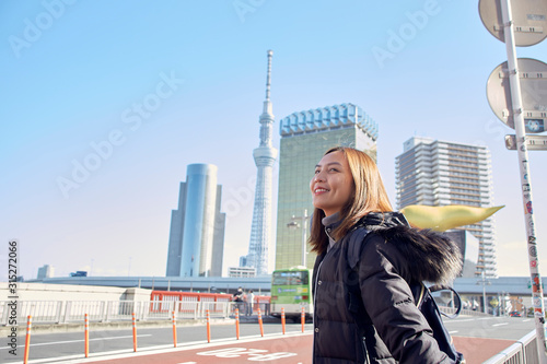 Woman tourist is visiting Enjoy the view Asakusa in Tokyo, Japan, photo