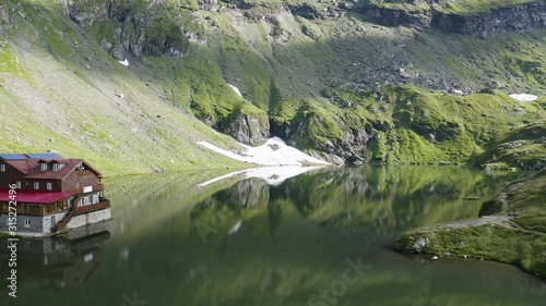 4K Balea Lake Chalet Romania Drone Aerial Reveal Summer Carpathian Mountains photo