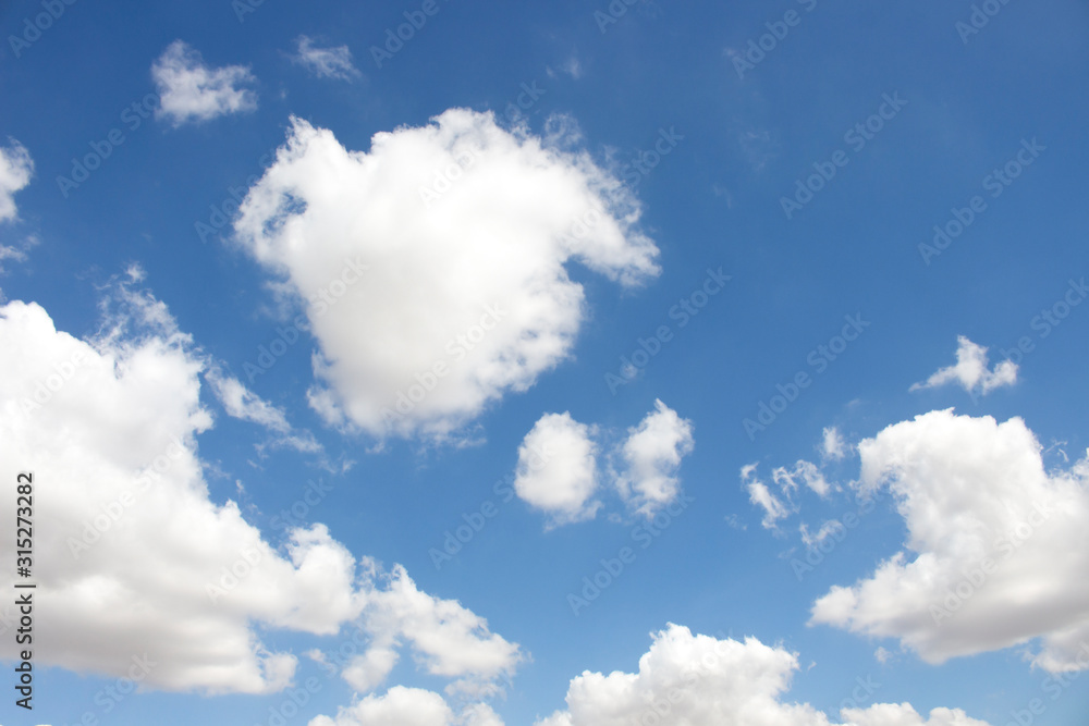 Bright blue sky with white clouds for background or wallpapers Bright blue sky with white clouds for background or wallpapers
