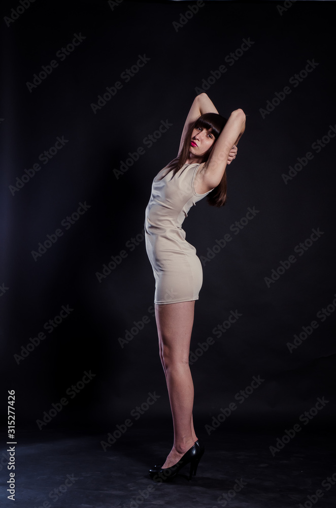 beautiful brunette girl in short blue dress beautiful brunette girl in short blue dress