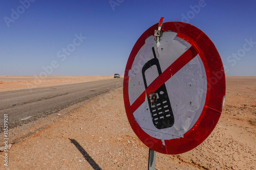 Marsa Matrouh, Egypt A sign forbidding the use of mobile phones while driving.