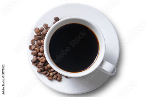 Cup of coffee and coffee beans on white plate isolated on white from top view