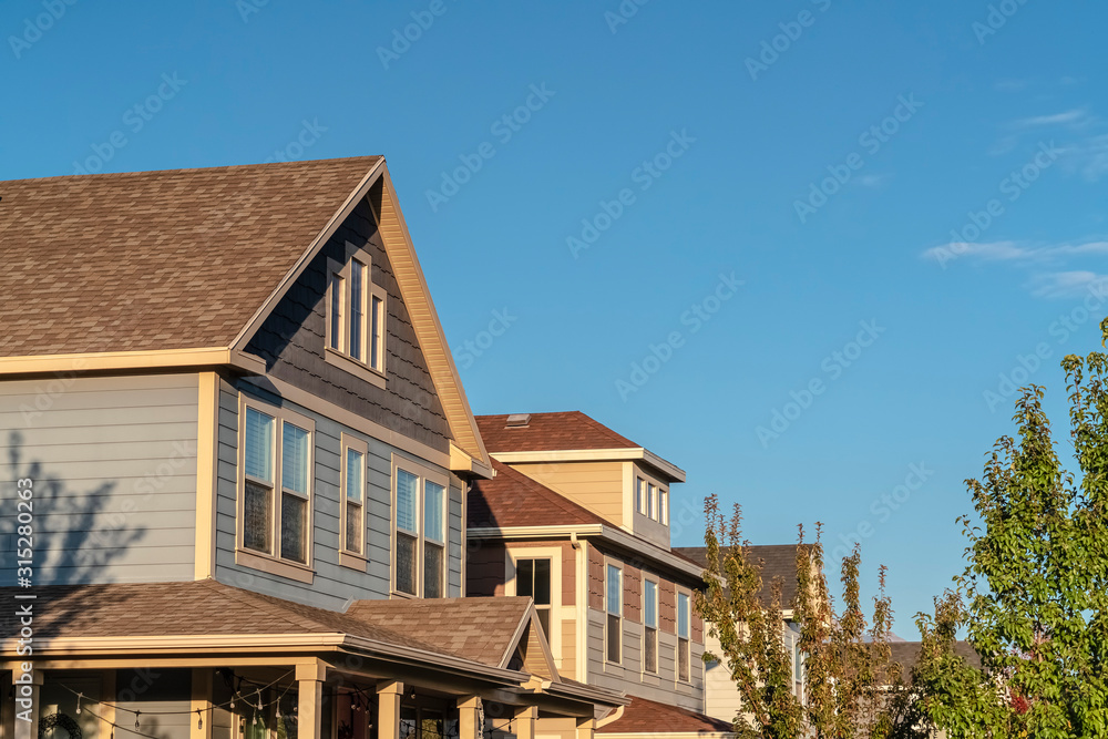 Looking up at upper floors of residential homes Looking up at upper floors of residential homes