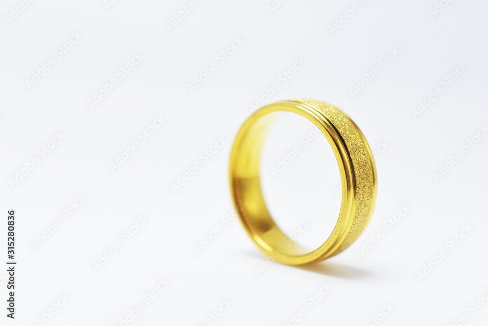 Golden wedding ring on white background,couple Love marry