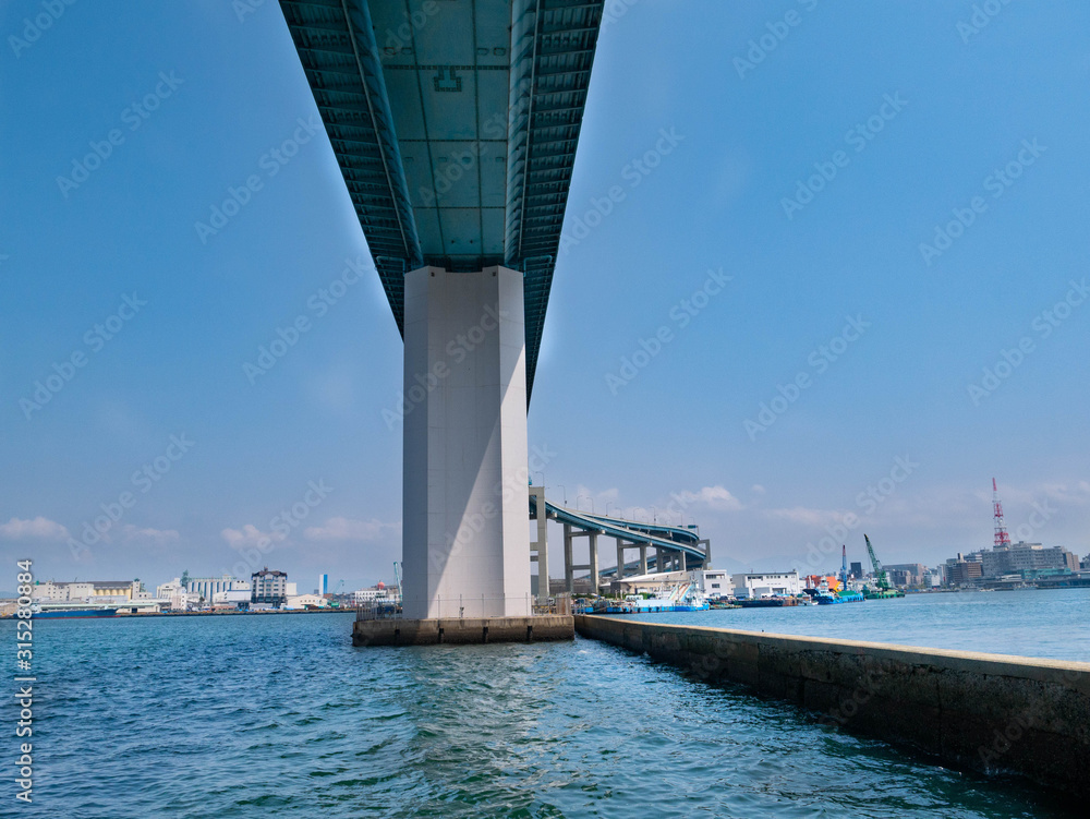 Highway bridge is across the bay area in Fukuoka city, JAPAN.