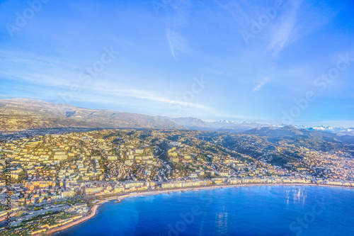 A view from the high at sunrise on the Cote d'azur, the city of Nice and the Maritime Alps, France.