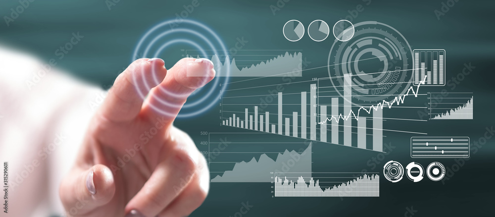 Woman touching a financial analysis concept Woman touching a financial analysis concept
