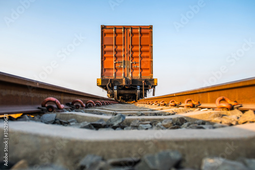 Containers on trains and railway tracks waiting for transportation