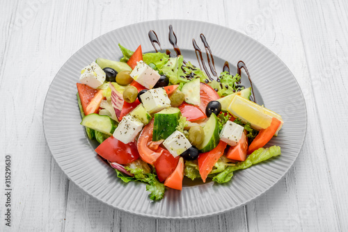 Healthy food, greek salad with vegetables and spices