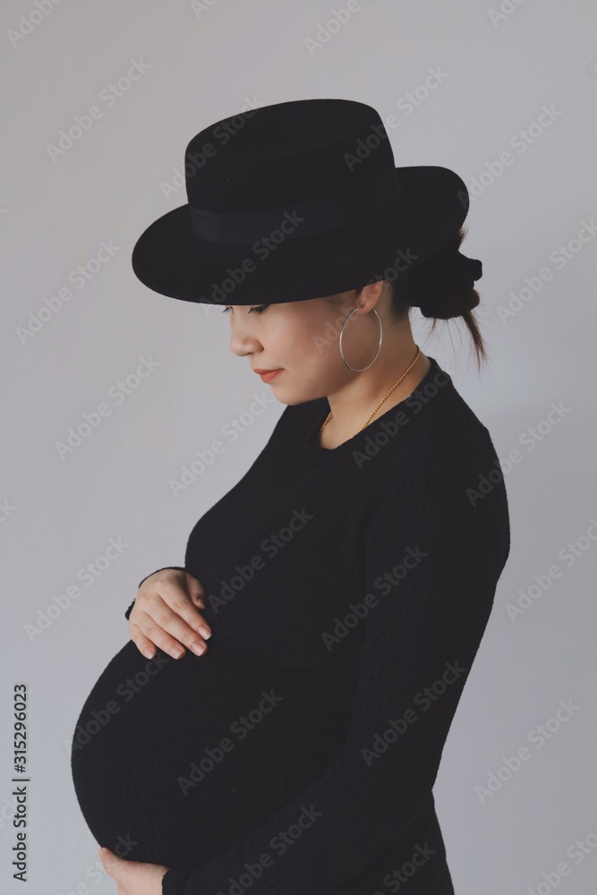 woman in black hat woman in black hat