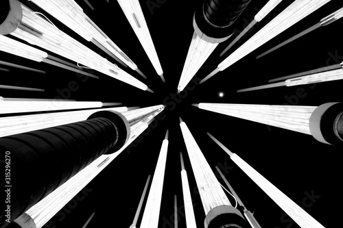 Parque de la Luz Medellin Colombia Park of many tall illuminated lamps, Black and white photography. Abstraction,