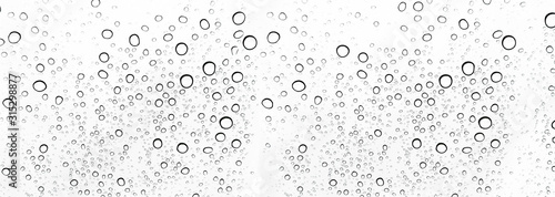 Rain drops on window glasses surface Natural Pattern of raindrops. Natural pattern of raindrops on white background for your design. © NOKFreelance