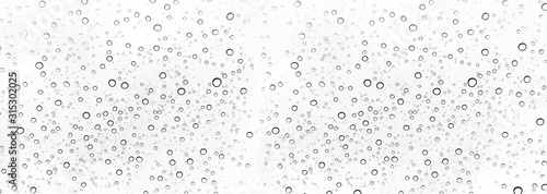 Rain drops on window glasses surface Natural Pattern of raindrops. Natural pattern of raindrops on white background for your design. photo