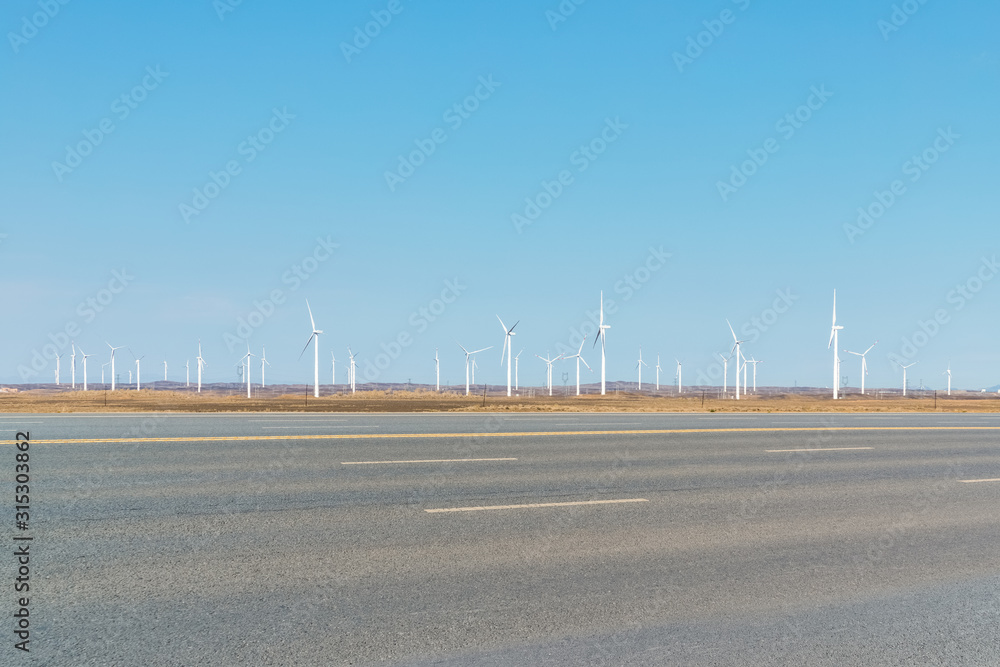 wind farm with highway background wind farm with highway background