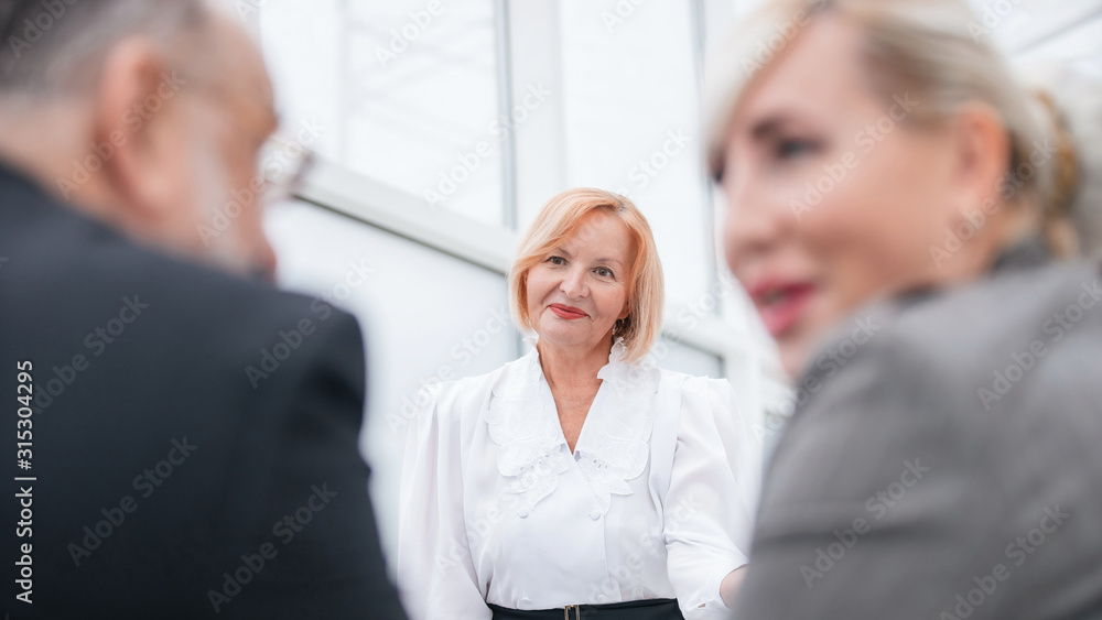 close up. a group of employees works in a modern office close up. a group of employees works in a modern office
