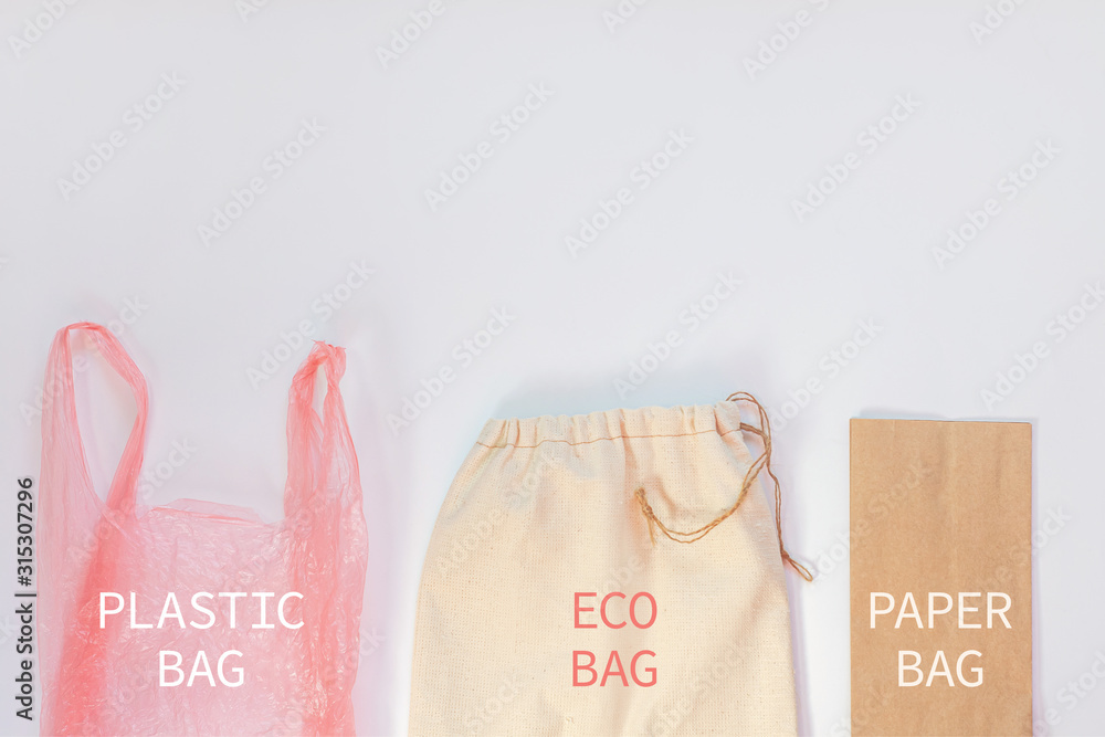 Foto de Plastic bag vs paper pack vs fabric eco bag. Say no to plastic