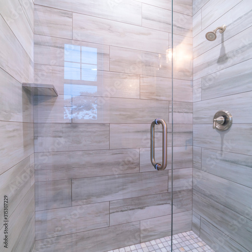 Square frame Large modern tiled shower cubicle bright interior