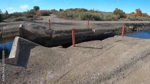 POV while driving along feeder irrigation canal from the Gila Gravity Canal - Yuma Irrigation District in southern Arizona
