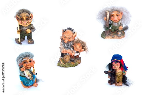 Collage of troll's figurines on a white background © Elena Noeva