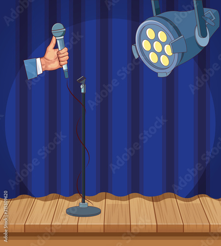 hand with microphone spotlight curtain wooden floor stand up comedy show