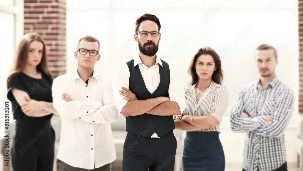 confident business team standing in a modern office confident business team standing in a modern office