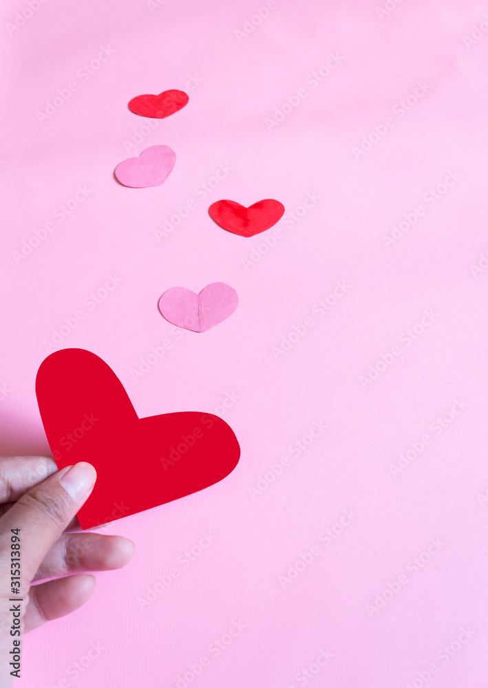 Hearts on pink background. Valentine's day concept. Love sign.