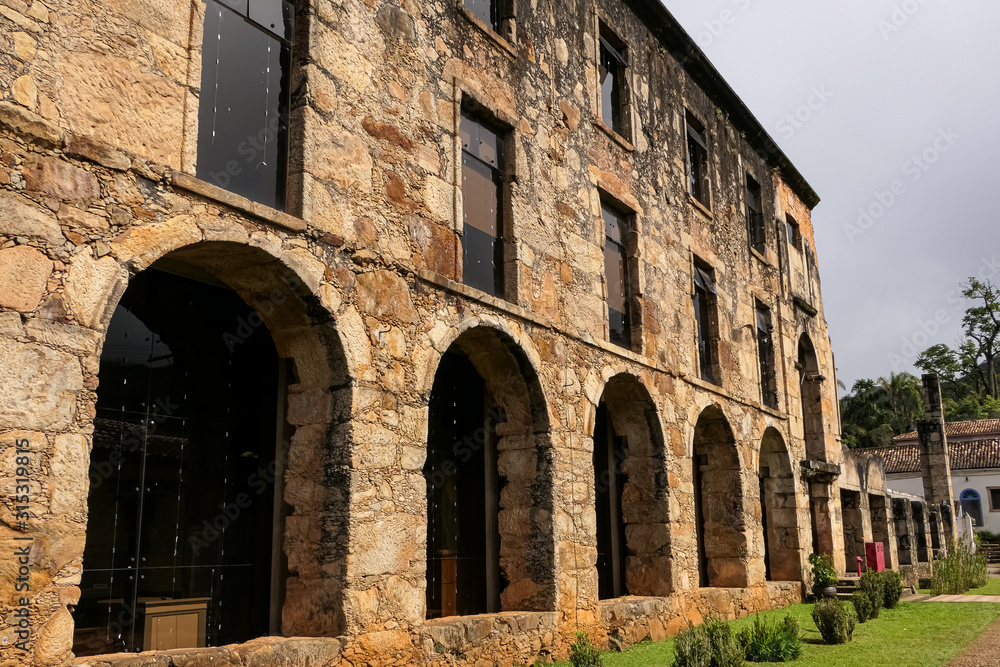 View to historic restored museum of  Sanctuary Caraça with arches and windows, Minas Gerais, Brazil
