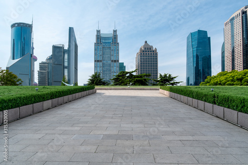 modern skyline and empty road © 昊 周