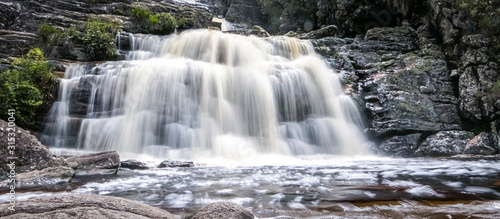 Close up of a beautiful waterfall with water motion blur and pond  Caraca natural park  Minas Gerais  Brazil