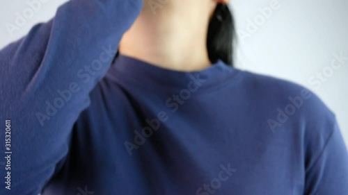 Young Asian woman have a feel sick and taking pills for her health in the bedroom. Health care and medical concept.