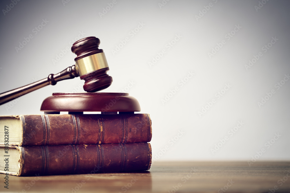 Judge gavel and law books in court background with copy space Stock Photo |  Adobe Stock