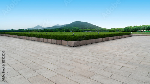 Empty Plaza Floor Bricks and Beautiful Natural Landscape