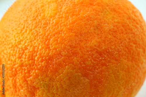 Orange peel. Vitamins Citrus. The fruit. Orange background Natural product. Pores. Cellulitis Obesity.