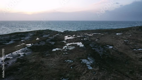 Huge waves breaking at Muckross Head - A small peninsula west of Killybegs, County Donegal, Ireland. The cliff rocks are famous for climbing photo