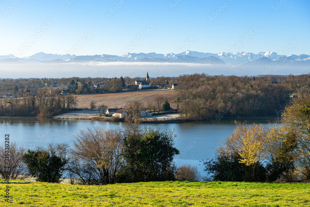 view of the lake Gabas in the Pyrenees Atlantiques, mountains in the background