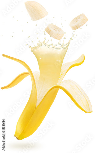 juice splashing out of an open and sliced banana floating isolated on white background
