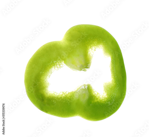 Slice of green bell pepper isolated on white
