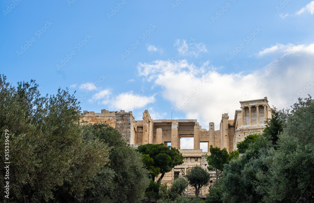 Athens, Greece. Acropolis slope. olive trees and ancient architecture.