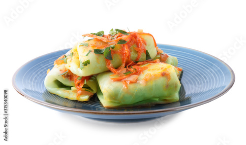 Delicious cabbage rolls with sauce isolated on white