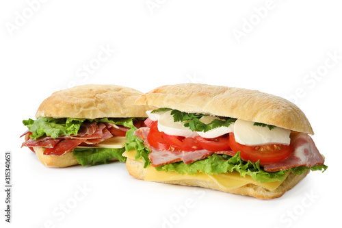 Delicious sandwiches with fresh vegetables isolated on white