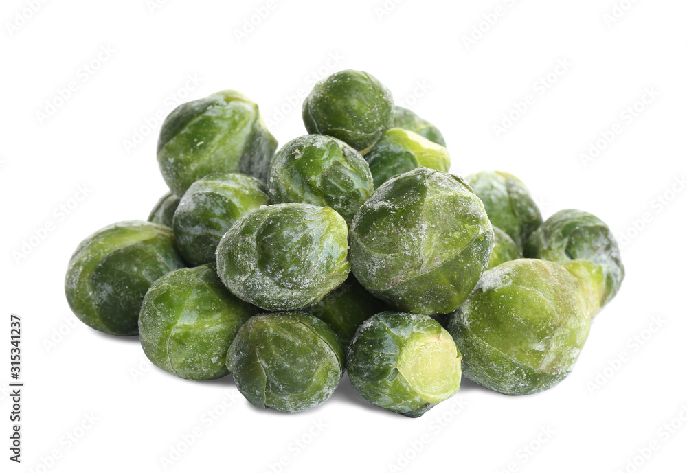 Pile of frozen Brussels sprouts isolated on white. Vegetable preservation Pile of frozen Brussels sprouts isolated on white. Vegetable preservation